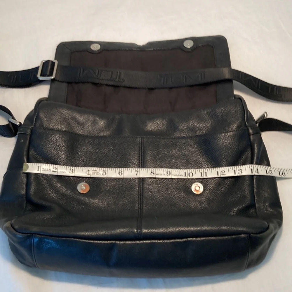 Tumi leather messenger tech lots of pockets